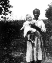David Alonzo Avant Jr. in the arms of his nursemaid Zellaria Griffin