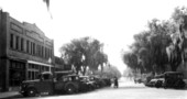 Cars parked on Main Street - Tavares, Florida.