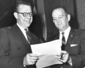 Representatives Frederick B. Karl (left) and E.C. Rowell looking over the House calendar for the day - Tallahassee, Florida.