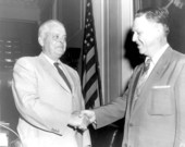 Senate President W. Turner Davis congratulates his sucessor Harry E. King