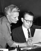 Representatives Mrs. Beth Johnson and Fred Karl push a bill for teach pay raise in a House session - Tallahassee, Florida.