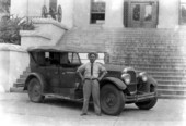 A locksmith posed with his 1928 Packard at the foot of Old Capitol's east steps - Tallahassee, Florida.