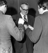 Newly sworn-in Justice Ben Overton (center) gets a hand from his sons during the enrobing ceremony - Tallahassee, Florida.