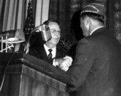 Superintendent of Public Instruction Thomas Bailey shaking the hand of an unidentified member of the Veterans of Foreign Wars - Tallahassee, Florida