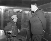Inside the engine cab with an official and engineer