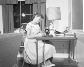 Mary Call Collins sewing