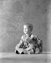 Portrait of Wade Marshall with a puppy - Tallahassee, Florida.