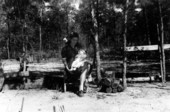 Woman holding her child.