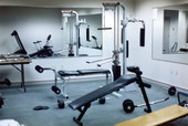 Interior view showing fitness machines at the Justice Raymond Ehrlich Memorial Exercise Room in the Florida Supreme Court Building - Tallahassee, Florida.