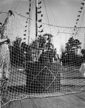 Workers pull up the net at FSU Flying Circus - Tallahassee, Florida