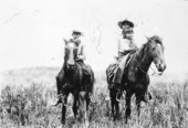 Three Seminole Indian boys on horseback