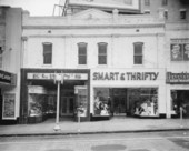 Smart and Thrifty Store window with other storefronts