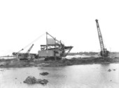 Ruteal mine with cranes.