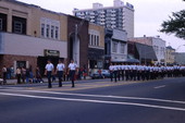 Military personnel marching in a parade on Monroe St. in downtown Tallahassee, Florida.