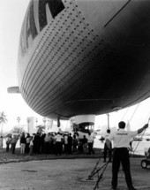 Tourists get a closer look at the Goodyear blimp.