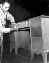 D.F. Thompson Jr. sands a vanity - Pensacola, Florida .