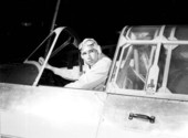 Pilot, John P. Altemus in his plane - Daytona Beach, Florida .