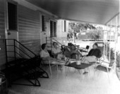 Unidentified residents outside a trailer home - Sarasota, Florida .