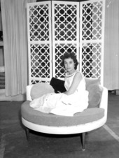 Mercedes Ficarrotta models a chair - Tampa, Florida .