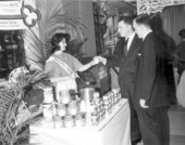 Unidentified woman serves refreshments at the Florida showcase .,