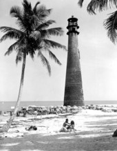 View of the Cape Florida Lighthouse by the beach at Bill Baggs Cape Florida State Park - Key Biscayne, Florida