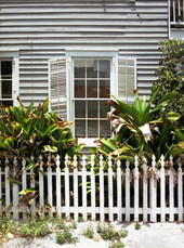 Window of conch house on Elizabeth Street - Key West, Florida