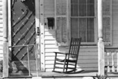 Porch of conch house on Fleming Street next to the "Eden House", Key West, Florida.