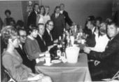 View of people at table during an Employee Welfare Association Halloween dance at the U.S. Navy Mine Defense Laboratory - Panama City, Florida.