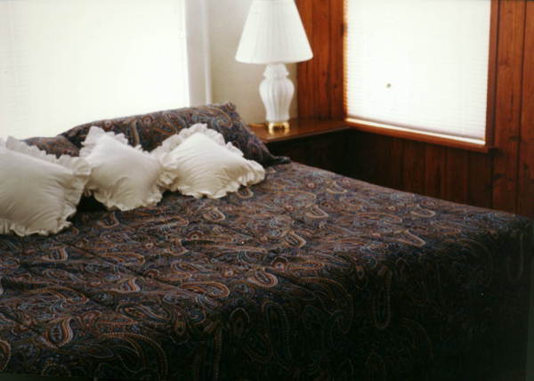 Bed in the master bedroom